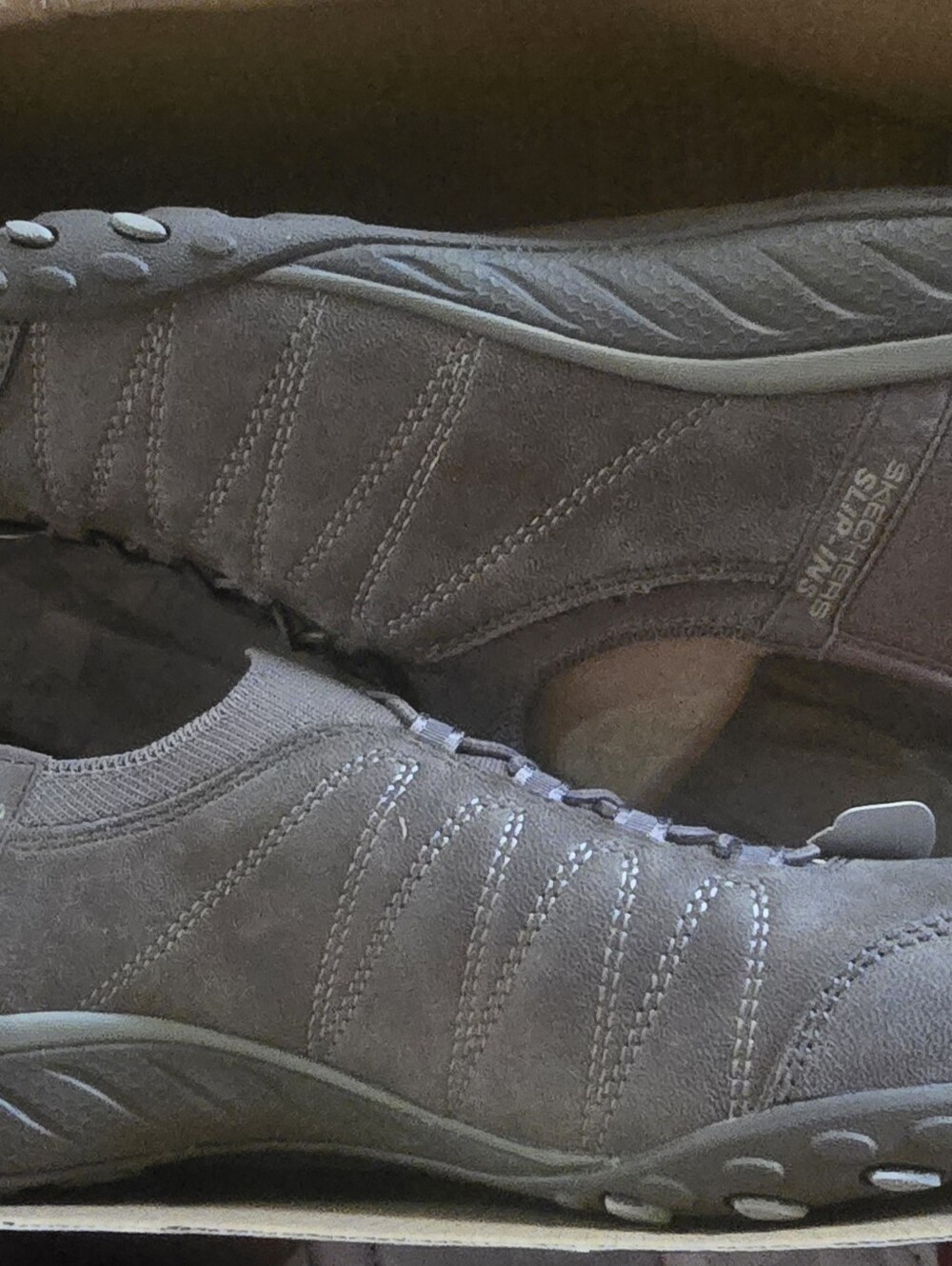 Skechers Womens Slip-On Sneakers in Gray Suede